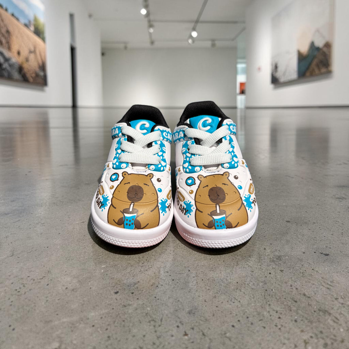 Río, zapatos de bebé con capibara Christhinne