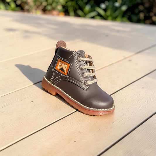 Bruno, botín chocolate con suela beige Christhinne